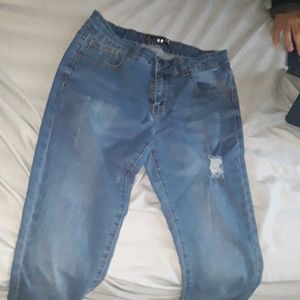 Blue ripped skinny jeans